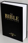 Illustration: Bible Thompson NBS sans onglets, couverture cartonnée noire, tranche blanche.